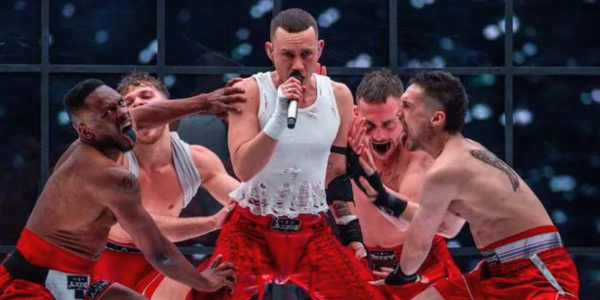 Watch: Olly Alexander, Four Hunky Dancers Lace Up for a Boxing Ring Rendition of 'Dizzy' at Eurovision
